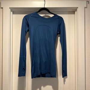 Lululemon long sleeved workout top, size 6. Blue.